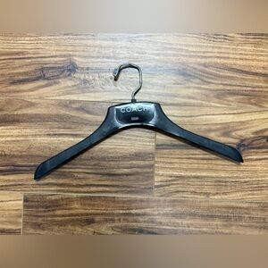Coach hanger metal and plastic, new